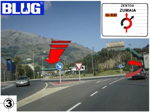 Photo descriptive qui explique le cinquième pas à suivre pour arriver à Blug où il faut suivre tout droit vers Zestoa-Zumaia. (route GI-631)